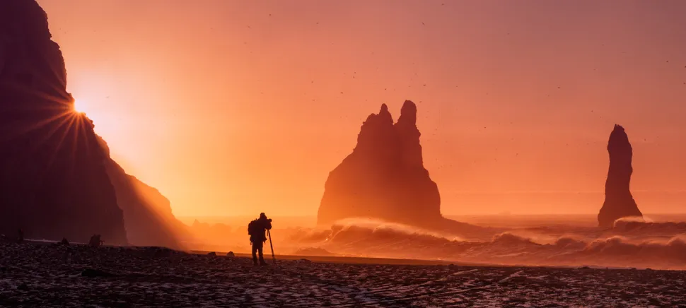 photographe dans un paysage panoramique